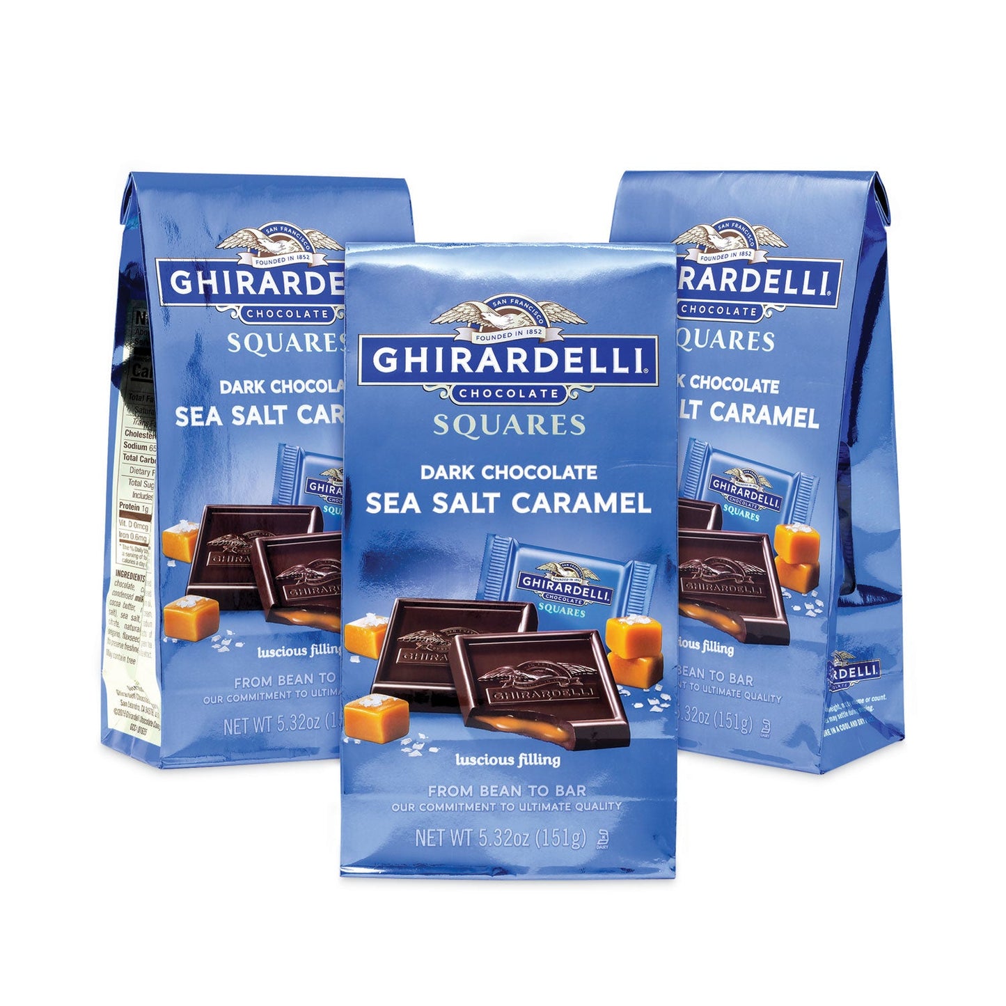 Close-up of unwrapped dark chocolate square with sea salt caramel filling visible.product-image