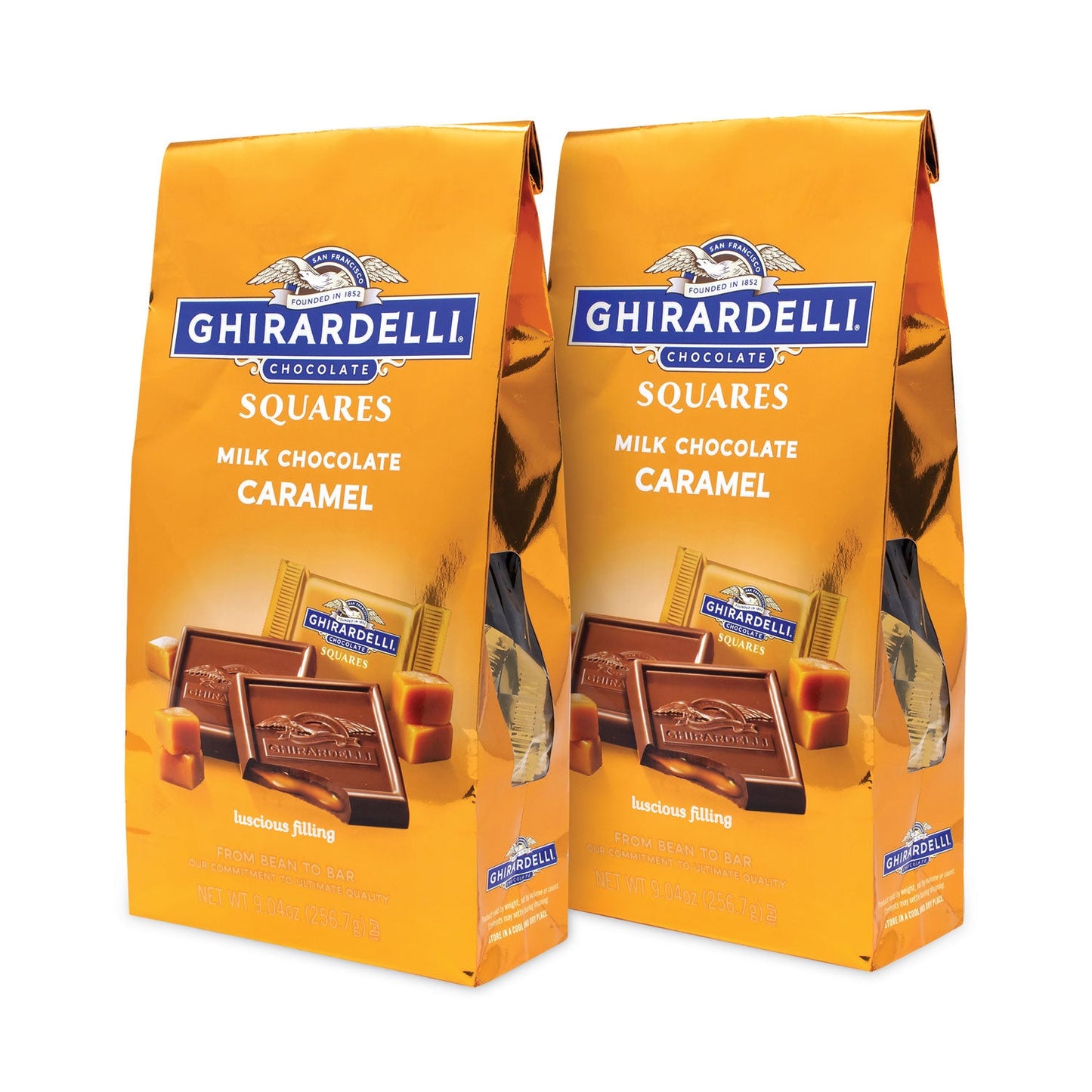Close-up of individually wrapped milk chocolate and caramel squares spilling from opened bag.product-image
